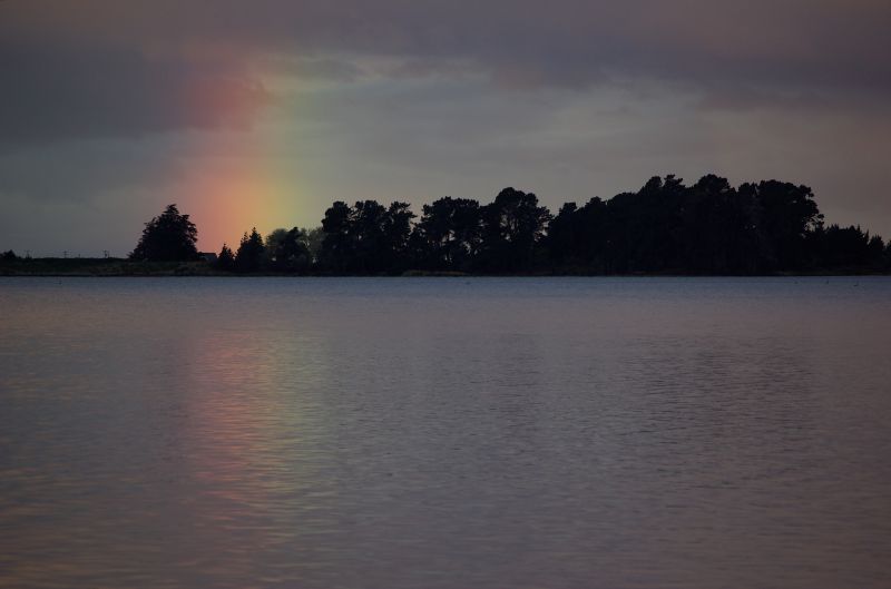 Rainbow at dusk south of Moeraki.